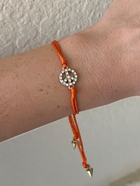 Rachel by Rachel Roy orange rhinestone adjustable peace sign bracelet